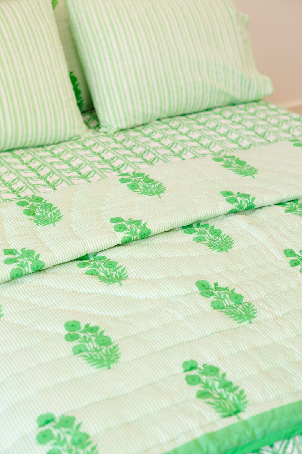 Razai Quilt in Poppy Stamp, Greenbriar